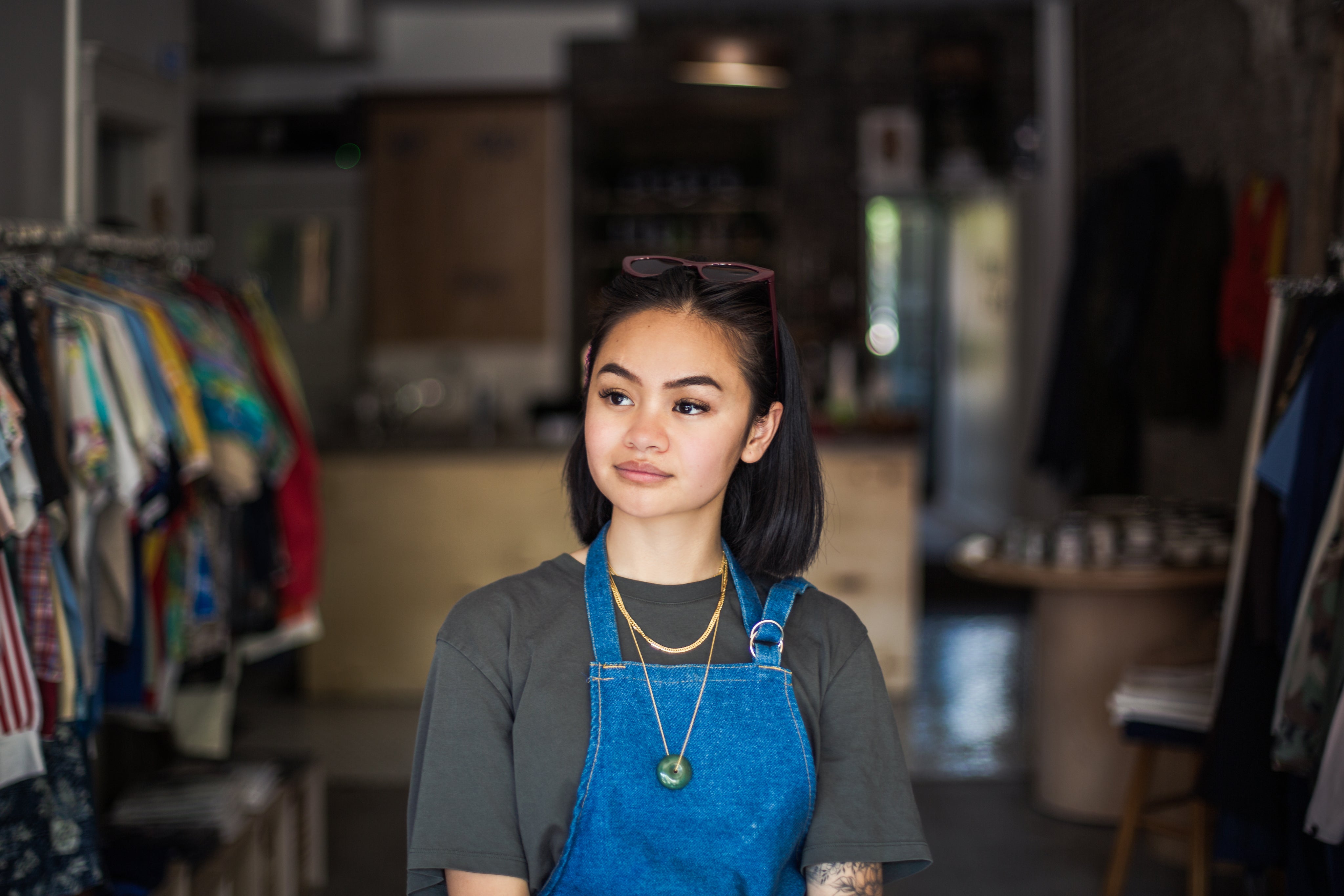 files/woman-stands-in-store-with-apron-on.jpg